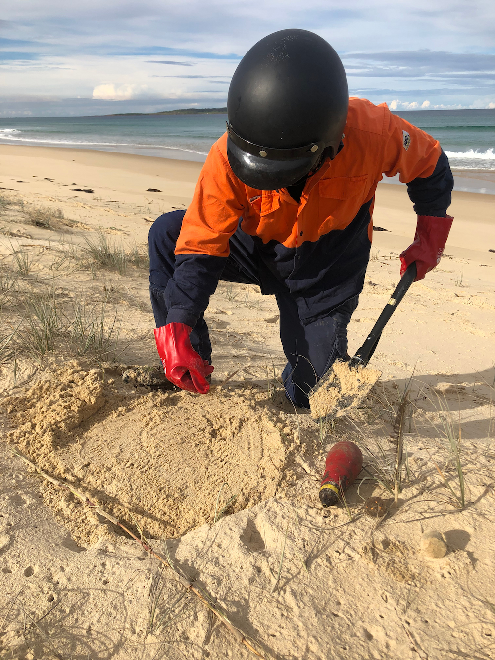 A bait station being installed as part of pest animal management work